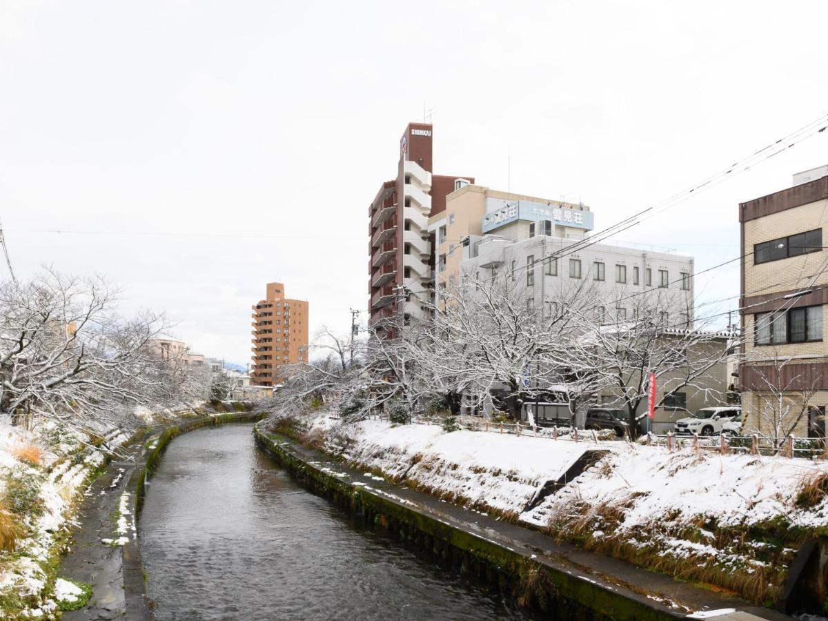 Tabist Business Ryokan Hotel Yukimiso Toyama Bagian luar foto