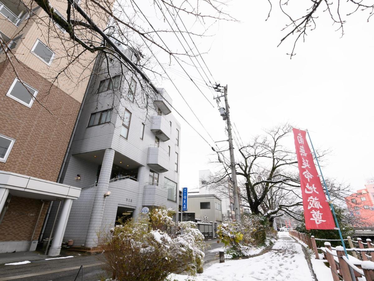 Tabist Business Ryokan Hotel Yukimiso Toyama Bagian luar foto